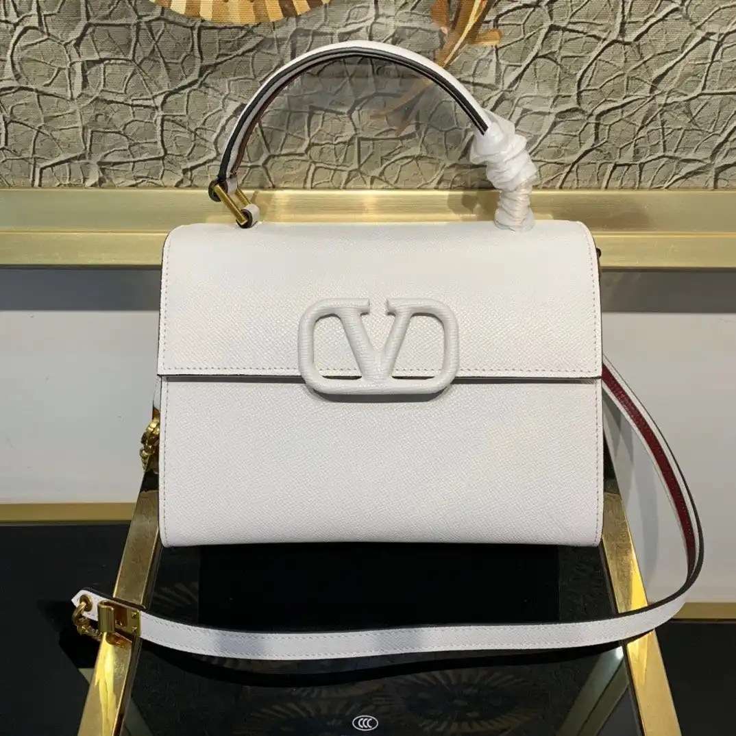 VALENTINO SMALL VSLING GRAINY CALFSKIN HANDBAG 0204